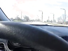 Lady driving in high heels & nylon stockings